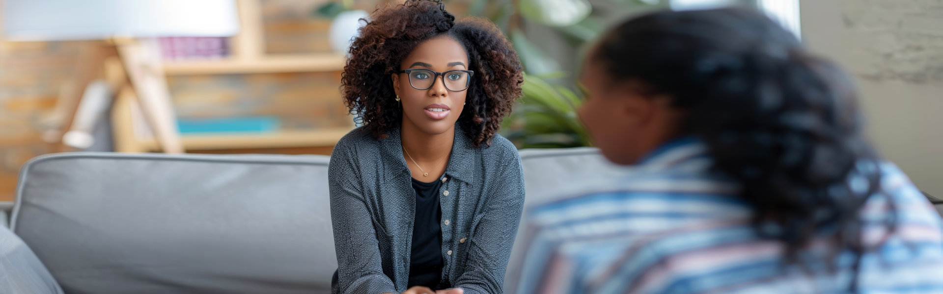 female counselor demonstrating empathy during a therapy session 
