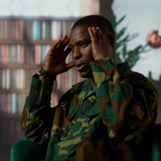 African american soldier remembering war flashbacks and dealing with a serious case of shell shock syndrome, traumatic memories. Armed forces veteran feels guilty with PTSD. Camera B.
